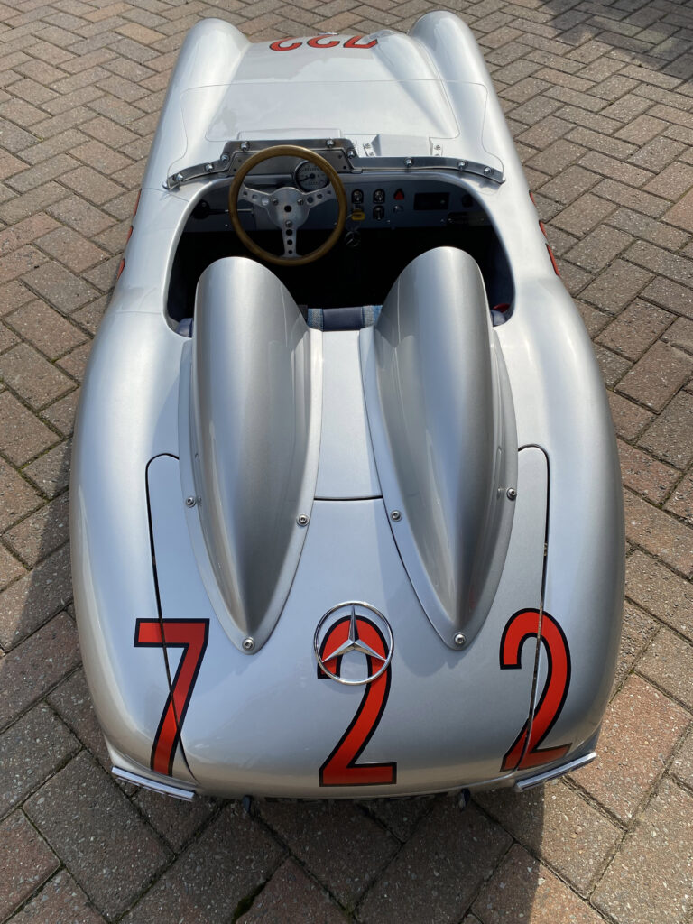 A stunning child-sized replica of Sir Stirling Moss' 1955 Mille Miglia-winning Mercedes-Benz 300 SLR is up for auction, with bids expected between £8,000 and £10,000.