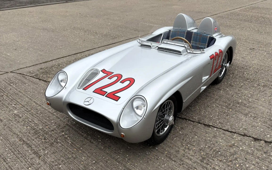 A stunning child-sized replica of Sir Stirling Moss' 1955 Mille Miglia-winning Mercedes-Benz 300 SLR is up for auction, with bids expected between £8,000 and £10,000.