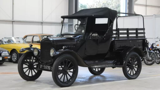 A vintage Ford Model T, featured in Downton Abbey and Fantastic Beasts, has sold for £9,600, showcasing its enduring legacy as the car that put the world on wheels.