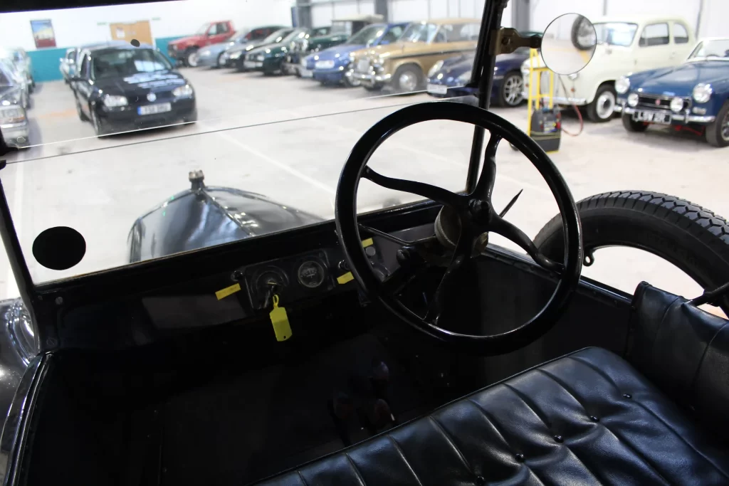 A vintage Ford Model T, featured in Downton Abbey and Fantastic Beasts, has sold for £9,600, showcasing its enduring legacy as the car that put the world on wheels.