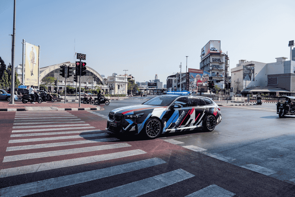 MotoGP kicks off 2025 in Bangkok with a fan event unveiling the new BMW M5 Touring MotoGP Safety Car, featuring a powerful M HYBRID powertrain and racetrack-ready design.