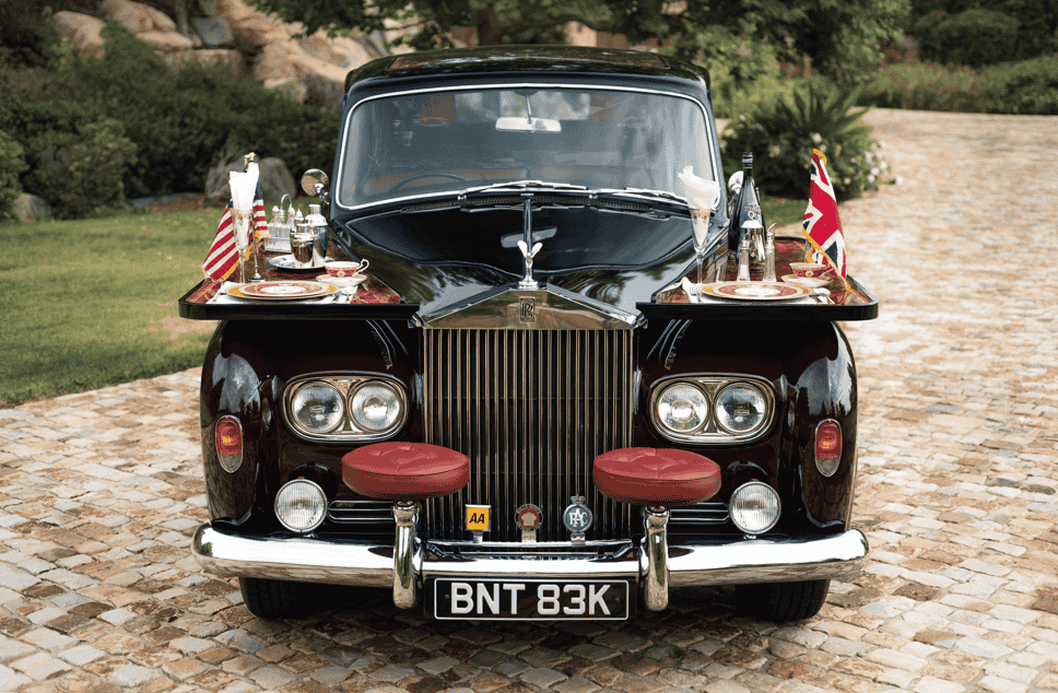 The Rolls-Royce Phantom VI, the last fully coachbuilt model, defined luxury in the 1980s and remains a symbol of bespoke craftsmanship and royal prestige.