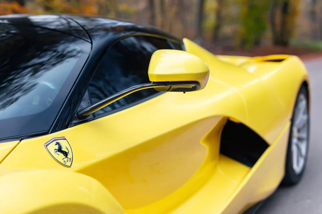 A rare yellow Ferrari LaFerrari - one of just nine ever made - is up for auction at £3.2M. With only 2,149 miles, this 963bhp hybrid hypercar is a collector's dream!