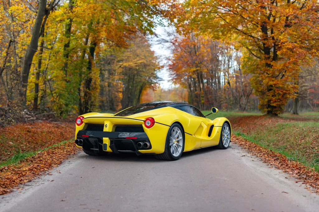 A rare yellow Ferrari LaFerrari - one of just nine ever made - is up for auction at £3.2M. With only 2,149 miles, this 963bhp hybrid hypercar is a collector's dream!