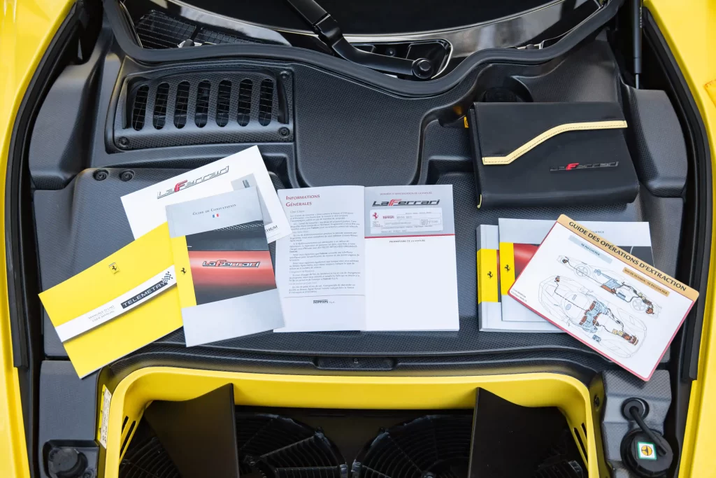 A rare yellow Ferrari LaFerrari - one of just nine ever made - is up for auction at £3.2M. With only 2,149 miles, this 963bhp hybrid hypercar is a collector's dream!