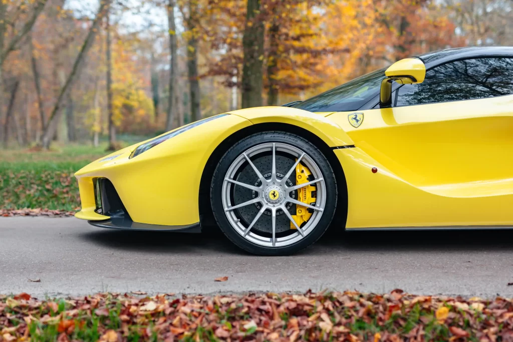 A rare yellow Ferrari LaFerrari - one of just nine ever made - is up for auction at £3.2M. With only 2,149 miles, this 963bhp hybrid hypercar is a collector's dream!