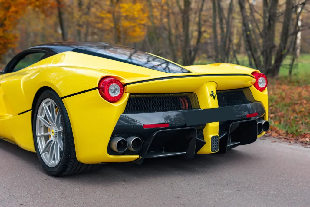 A rare yellow Ferrari LaFerrari - one of just nine ever made - is up for auction at £3.2M. With only 2,149 miles, this 963bhp hybrid hypercar is a collector's dream!