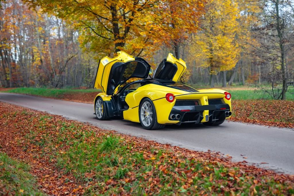 A rare yellow Ferrari LaFerrari - one of just nine ever made - is up for auction at £3.2M. With only 2,149 miles, this 963bhp hybrid hypercar is a collector's dream!