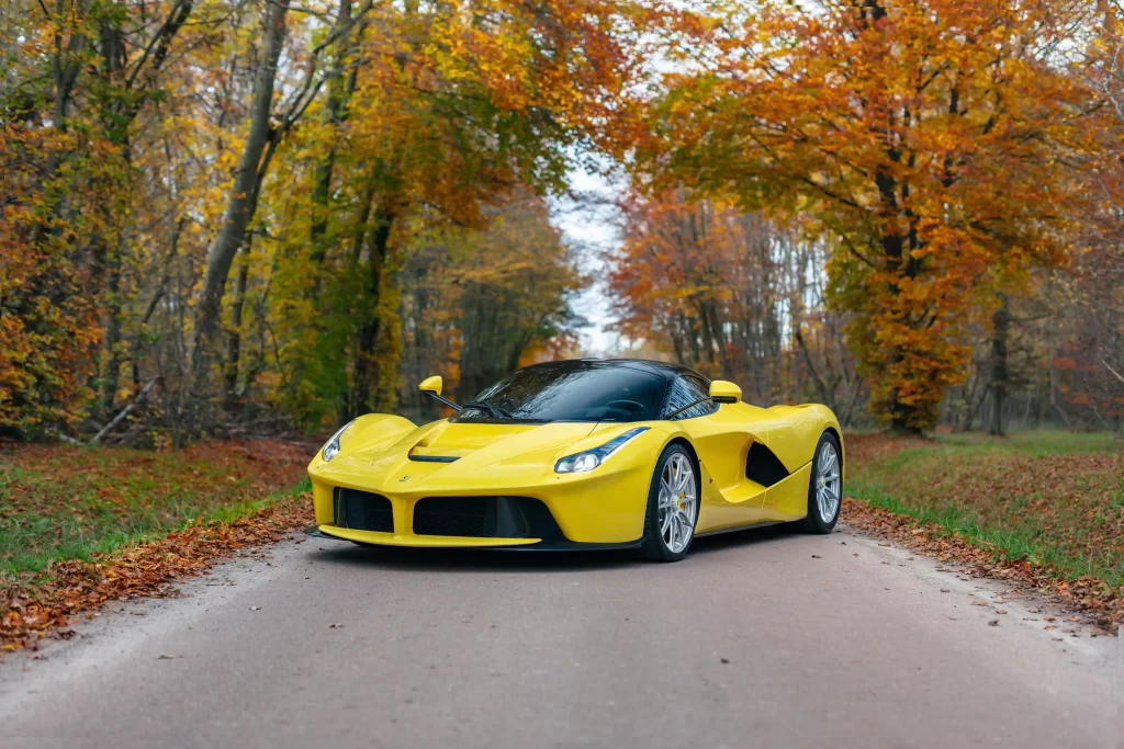 A rare yellow Ferrari LaFerrari - one of just nine ever made - is up for auction at £3.2M. With only 2,149 miles, this 963bhp hybrid hypercar is a collector's dream!