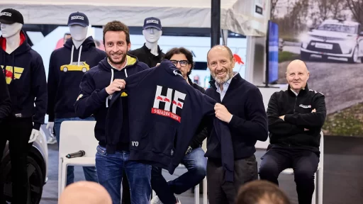 Lancia and Sparco revive their motorsport legacy with a new HF sportswear line, unveiled at the Rally Racing Meeting alongside Lancia’s return to rally competition.