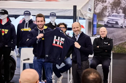 Lancia and Sparco revive their motorsport legacy with a new HF sportswear line, unveiled at the Rally Racing Meeting alongside Lancia’s return to rally competition.