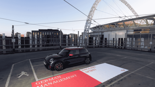 MINI welcomes Thomas Tuchel with a towel-reserved parking spot at Wembley, playfully celebrating English spirit and German precision ahead of his England debut.