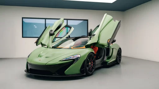 A rare 217mph McLaren P1, never driven and with just 80 miles, is up for sale at £1.2M. The unique matte green supercar goes to auction in Dubai this month.