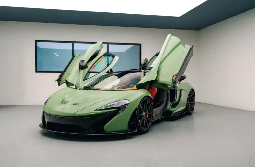 A rare 217mph McLaren P1, never driven and with just 80 miles, is up for sale at £1.2M. The unique matte green supercar goes to auction in Dubai this month.