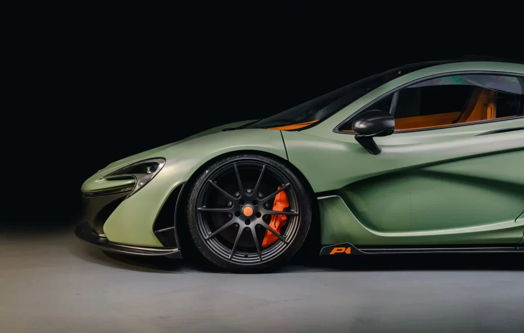 A rare 217mph McLaren P1, never driven and with just 80 miles, is up for sale at £1.2M. The unique matte green supercar goes to auction in Dubai this month.