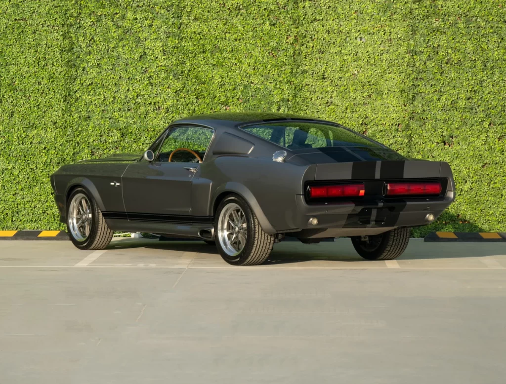 A 1967 Shelby Mustang GT500, an officially licensed Eleanor replica from Gone in 60 Seconds, is for sale in Dubai for £195,000, boasting 545 horsepower and iconic styling.