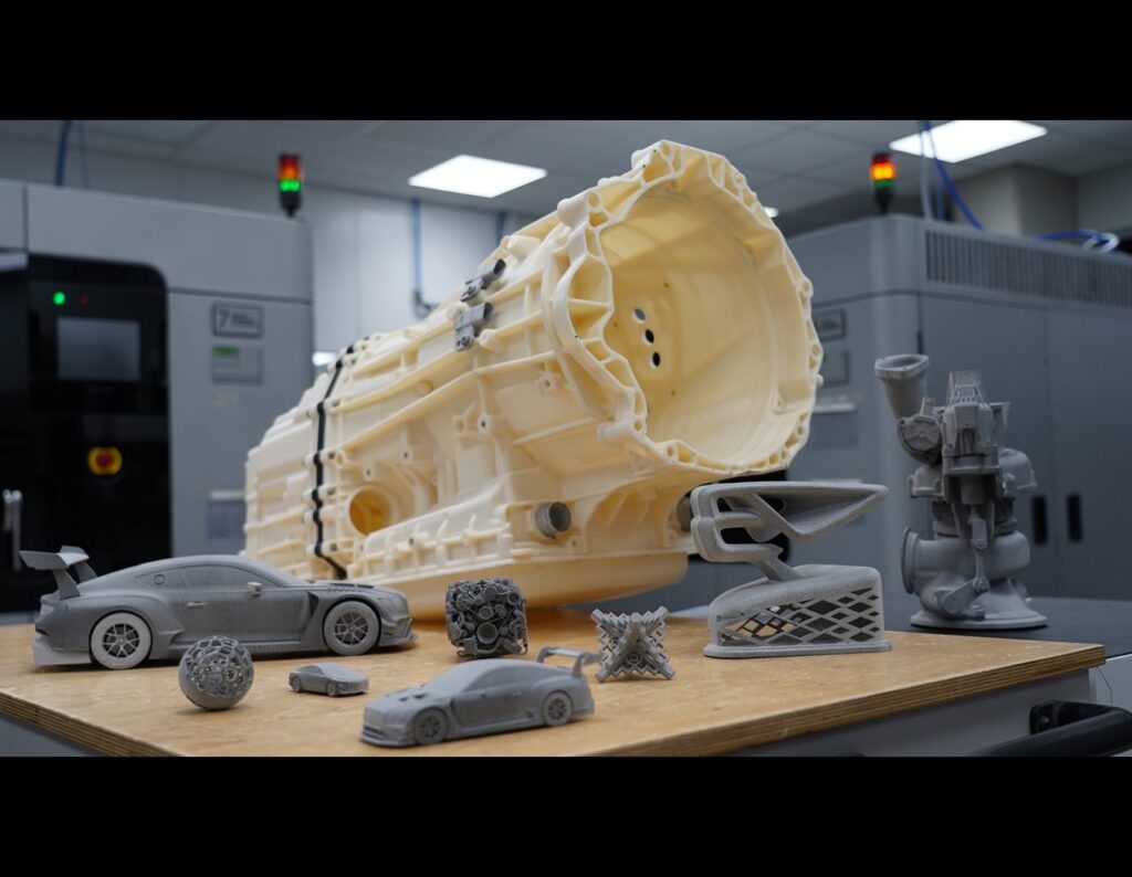 Bentley celebrates 25 years of Additive Manufacturing at its Crewe HQ, showcasing 3D printed gold, sustainability strides, and innovation driving its electric future.