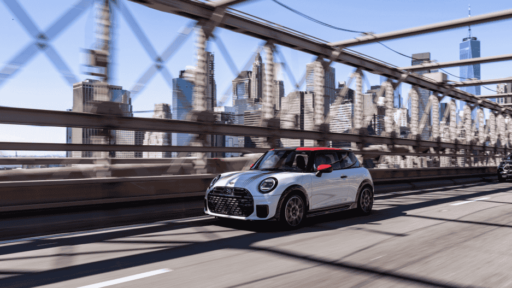 The MINI John Cooper Works brings 231 hp, bold Chili Red styling, and advanced tech to New York City, delivering sporty precision and standout design in every turn.