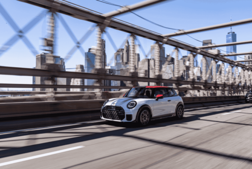 The MINI John Cooper Works brings 231 hp, bold Chili Red styling, and advanced tech to New York City, delivering sporty precision and standout design in every turn.