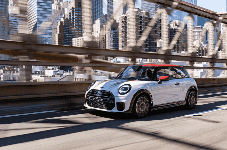 The MINI John Cooper Works brings 231 hp, bold Chili Red styling, and advanced tech to New York City, delivering sporty precision and standout design in every turn.