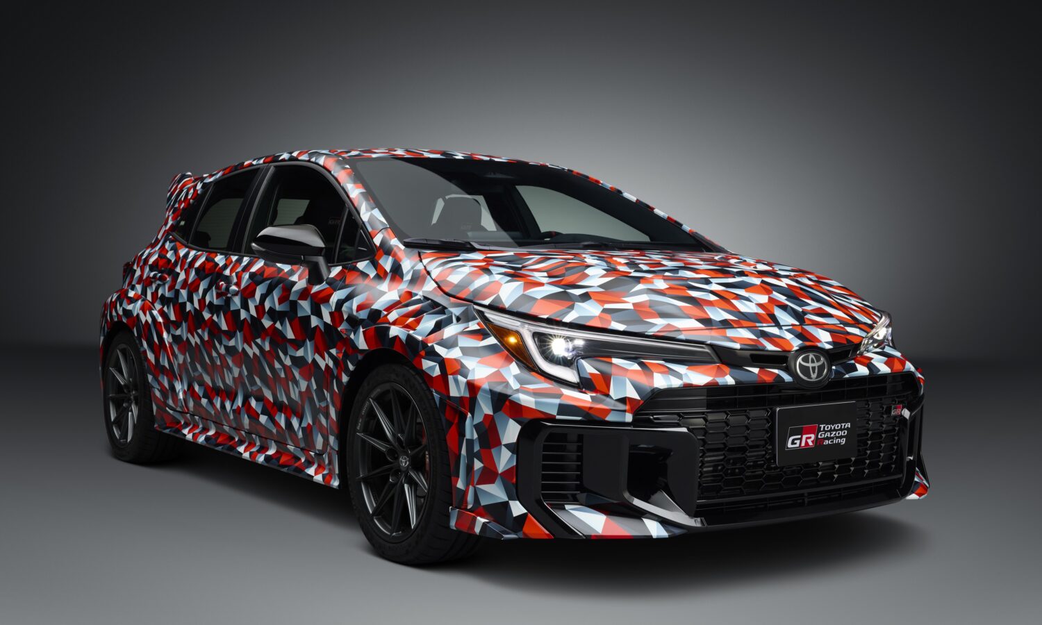 Toyota previews a camouflaged GR Corolla prototype with enhanced aerodynamics, torque boost, and track-ready features ahead of Formula Drift Long Beach event.