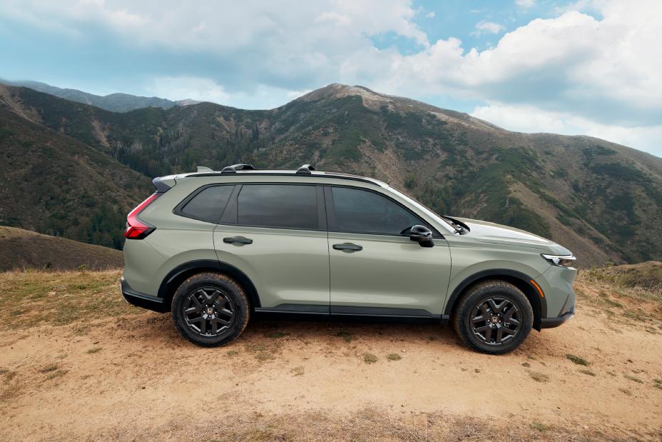 The 2026 Honda CR-V adds more standard tech and debuts the TrailSport Hybrid trim, combining rugged styling, off-road capability, and advanced electrified performance.