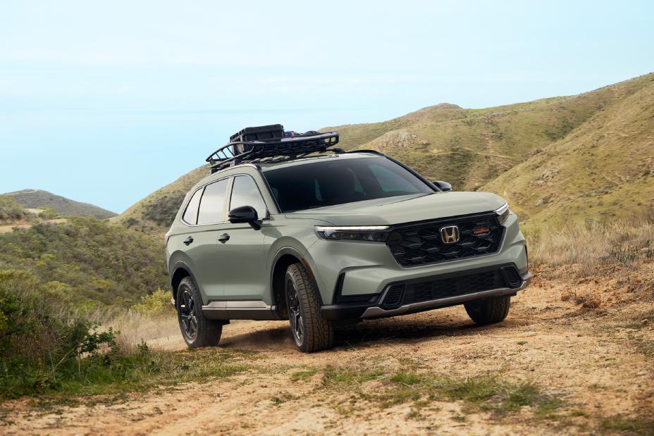 The 2026 Honda CR-V adds more standard tech and debuts the TrailSport Hybrid trim, combining rugged styling, off-road capability, and advanced electrified performance.