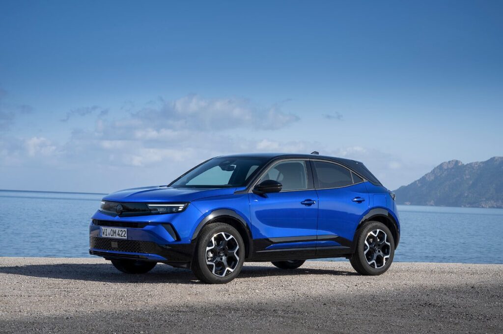 The 2026 Opel Mokka debuts bold new colors like Kolibri Blue and Tropikal Green, enhancing its stylish design while offering hybrid and electric options with eco features.