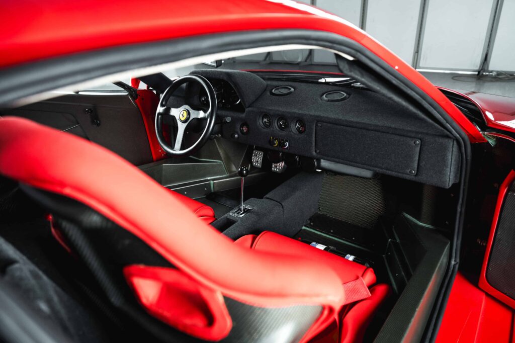 A rare 1989 Ferrari F40 with only 10,749 miles is set to sell for £2.3m at RM Sotheby’s Milan auction, potentially breaking the record for this iconic supercar.