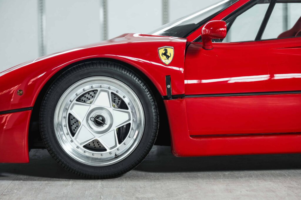 A rare 1989 Ferrari F40 with only 10,749 miles is set to sell for £2.3m at RM Sotheby’s Milan auction, potentially breaking the record for this iconic supercar.