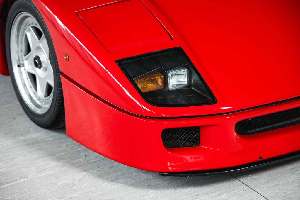 A rare 1989 Ferrari F40 with only 10,749 miles is set to sell for £2.3m at RM Sotheby’s Milan auction, potentially breaking the record for this iconic supercar.