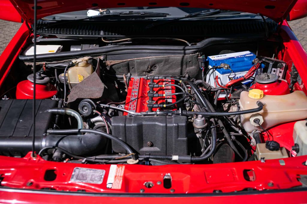 A rare Ford Sierra RS Cosworth in rosso red, once owned by a duke and racer, is set to fetch £90,000 at auction - over five times its original 1986 price.