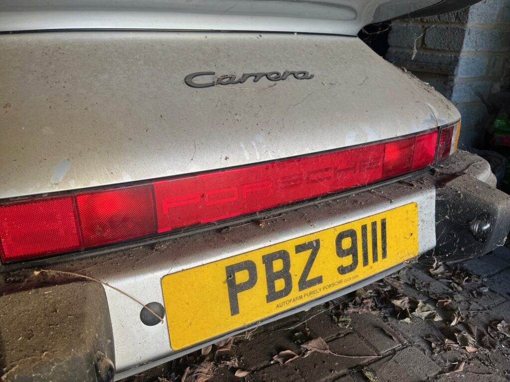 A barn-find 1989 Porsche 911 3.2 Carrera Sport with just 40,000 miles is up for sale at £25,000 after 14 years in storage, offering huge potential to collectors.