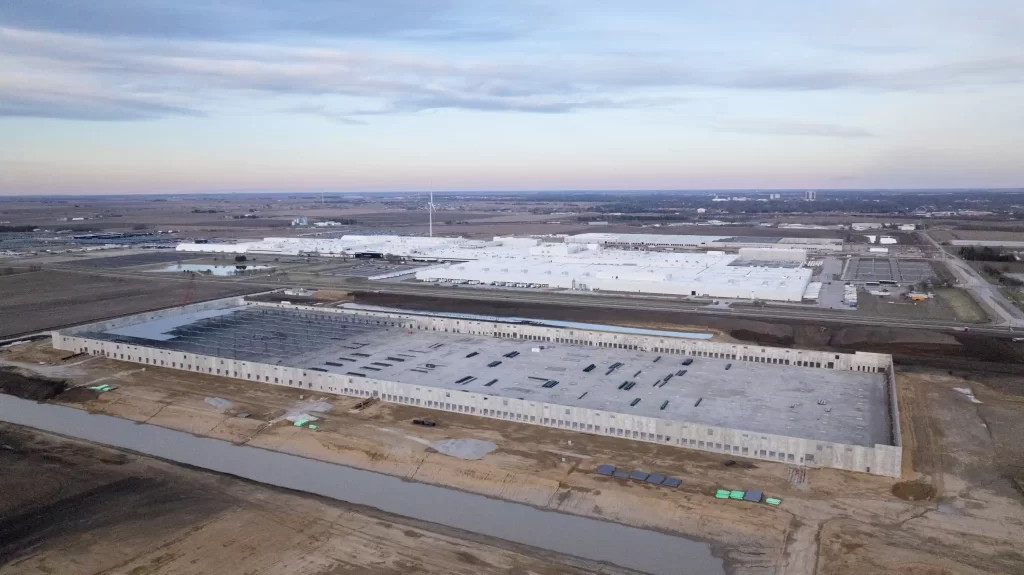 Rivian is investing nearly 120 million dollars in a new supplier park in Normal, Illinois, creating hundreds of jobs and boosting EV production efficiency by 2026.